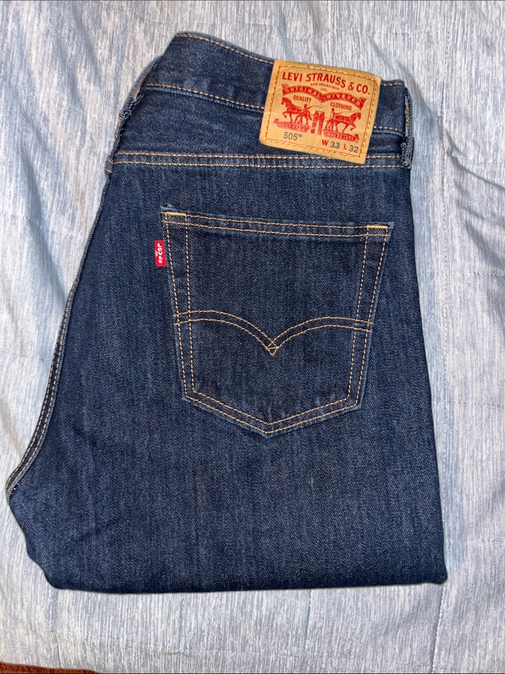 Levi's Men's Straight Jeans in Dark Indigo with Tan Patch